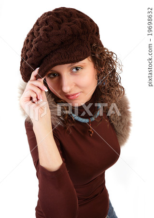 beautiful woman in winter hat isolated on a white 19698632