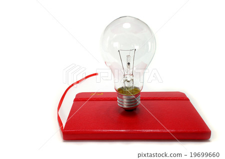 Light bulb on the notebook Light bulb on the notebook 19699660