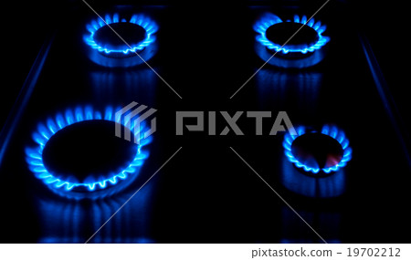 Gas burning from a kitchen gas stove Gas burning from a kitchen gas stove 19702212