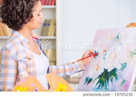 Young woman is painting a nature mort. Young woman is painting a nature mort. 19705236