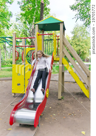 Active girl on nursery platform in summer 19705772