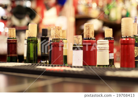 Bar, old wooden rack with glasses in the pub Bar, old wooden rack with glasses in the pub 19708413