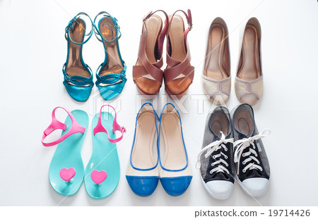 ladies shoes on wooden background 19714426