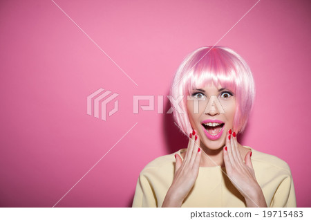 Cute young woman is evincing big shock 19715483