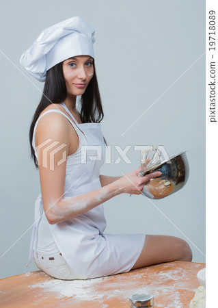 sexy woman in chef uniform knead the dough sexy woman in chef uniform knead the dough 19718089