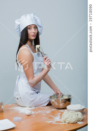 sexy woman in chef uniform knead the dough sexy woman in chef uniform knead the dough 19718090