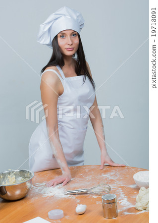 sexy woman in chef uniform knead the dough sexy woman in chef uniform knead the dough 19718091