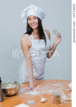 sexy woman in chef uniform knead the dough sexy woman in chef uniform knead the dough 19718092