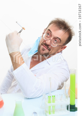 Crazy chemist smokes a cigarette Crazy chemist smokes a cigarette 19718167