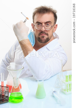 Crazy chemist smokes a cigarette Crazy chemist smokes a cigarette 19718168