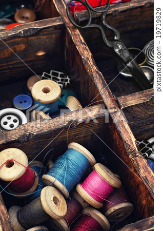 Spools of thread and buttons Spools of thread and buttons 19719829