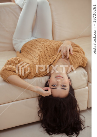 Young beautiful woman at home Young beautiful woman at home 19720261