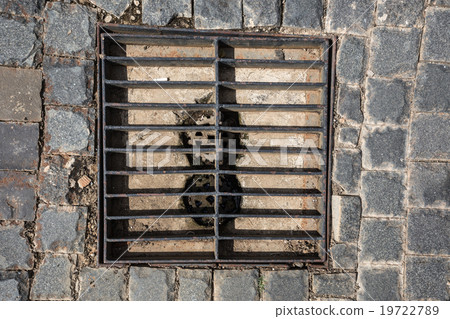 rectangular sewer with a rust and holes 19722789