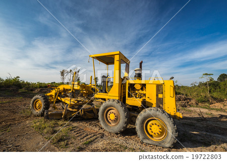 Wheel loader Excavator with flat tire in the field Wheel loader Excavator with flat tire in the field 19722803