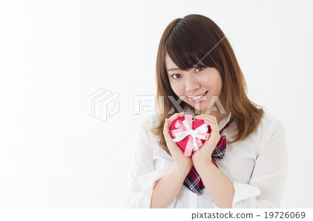 Girls high school student who shows gifts with a smile event Event image up Girls high school student who shows gifts with a smile event Event image up 19726069