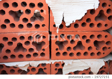 Stack of silicate bricks. Closeup. 19727231