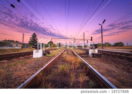 Railway station and traffic light  at sunset 19727806