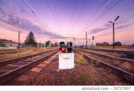 Railway station and traffic light  at sunset 19727807