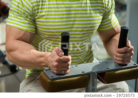 Sportsman in gym. Sportsman in gym. 19728573