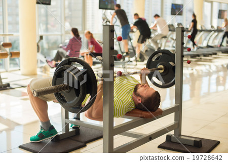 Sportsman with barbell. Sportsman with barbell. 19728642