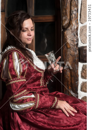 Pretty woman in red dress in retro baroque style Pretty woman in red dress in retro baroque style 19733431