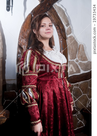 Attractive woman in red dress of retro style Attractive woman in red dress of retro style 19733434