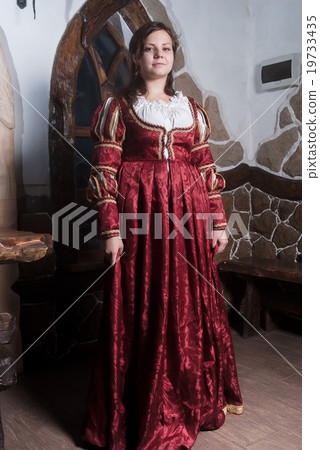 Attractive woman in red dress in retro baroque style Attractive woman in red dress in retro baroque style 19733435