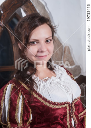 Attractive woman in red dress of retro style Attractive woman in red dress of retro style 19733436