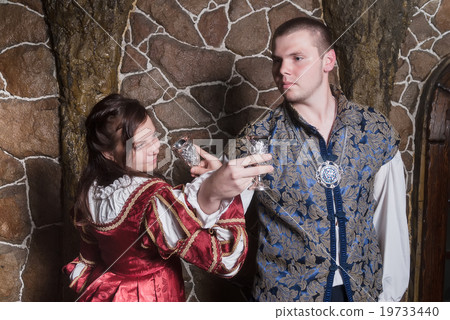 Attractive couple in retro dresses dance Attractive couple in retro dresses dance 19733440
