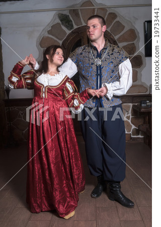 Attractive couple in retro dresses dance Attractive couple in retro dresses dance 19733441