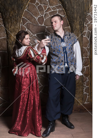 Attractive couple in retro dresses dance Attractive couple in retro dresses dance 19733442