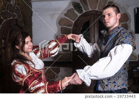 Attractive couple in retro dresses dance Attractive couple in retro dresses dance 19733443