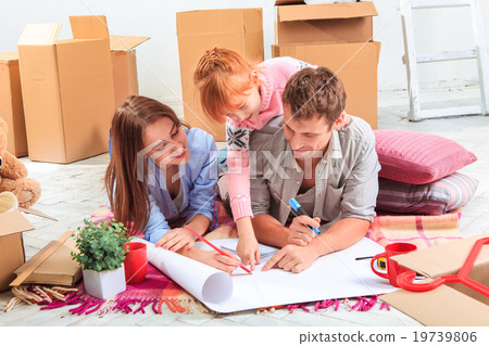 The happy family during repair and relocation The happy family during repair and relocation 19739806