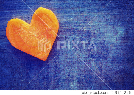 Vintage stylized heart made of carrot. 19741266