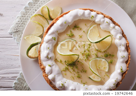 key lime pie with whipped cream close-up. top view key lime pie with whipped cream close-up. top view 19742646