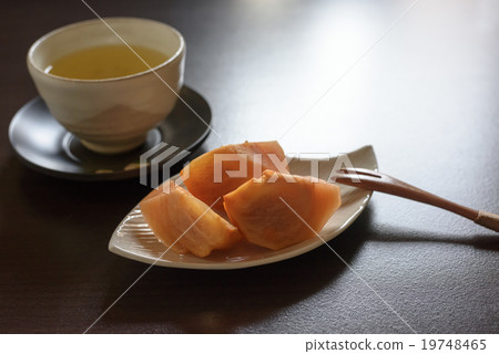 Persimmon and tea Persimmon and tea 19748465