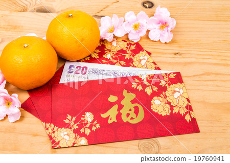 Red packet with Sterling Pound currency notes 19760941