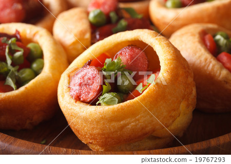 Yorkshire pudding with sausages macro. horizontal Yorkshire pudding with sausages macro. horizontal 19767293