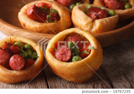 Yorkshire puddings stuffed with sausages macro 19767295