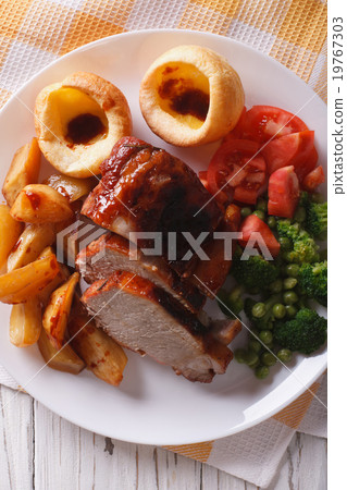 Sunday Roast on plate closeup vertical top view 19767303
