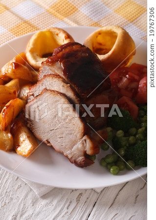 pork with potato, vegetable and Yorkshire pudding 19767306