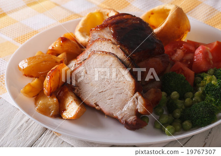pork with potato, vegetables and Yorkshire pudding 19767307