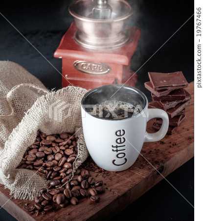 Cup of hot coffee with chocolate. 19767466
