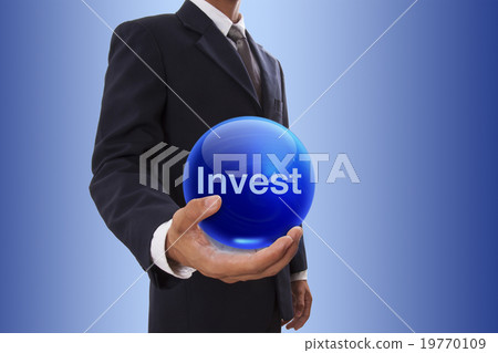 Businessman with invest word. Businessman with invest word. 19770109