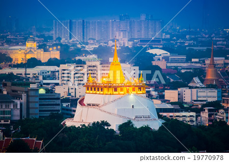 Golden stupa at wat sra ket temple in twilight 19770978