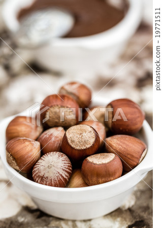 Chocolate Cream and Hazelnuts in White Bowls 19771511