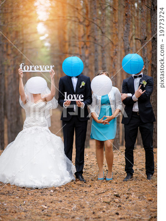 Bride groom and their friends at the wedding Bride groom and their friends at the wedding 19773724