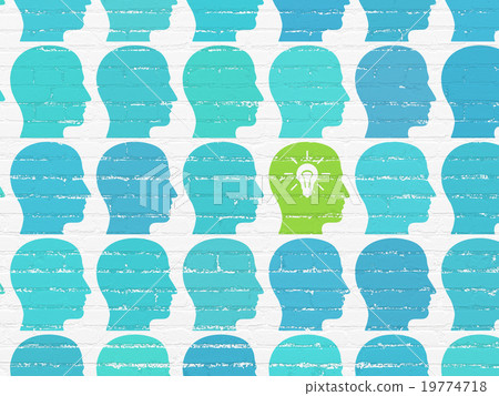 Finance concept: head with light bulb icon on wall 19774718
