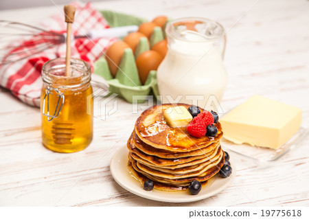 High pile of delicious pancakes 19775618