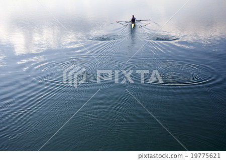Young man rowing 19775621